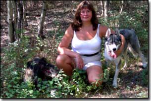 Husky-Isis with Barbara in a forest