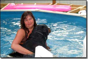 Rottie-Riot being rescued from pool by Barbara